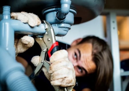 man-fixing-kitchen-sink-2025-02-10-12-57-28-utc (1).jpg